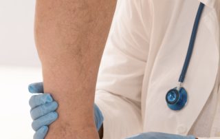 mdexamining-patients-leg