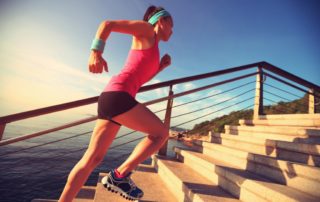 best exercises for varicose veins and leg health: running stairs on beach